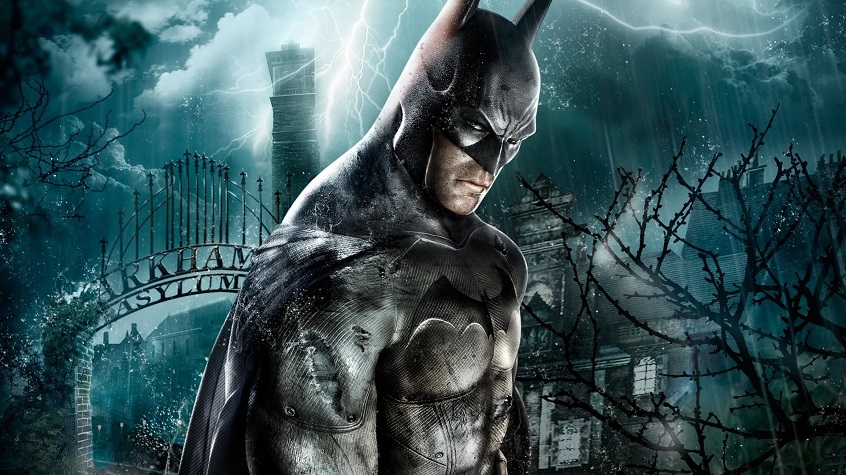 Batman Arkham Asylum title screen showing a rugged Batman with the asylum behind him.