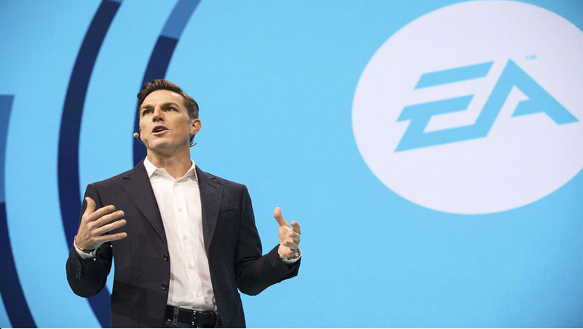 andrew wilson on stage for a ea conference