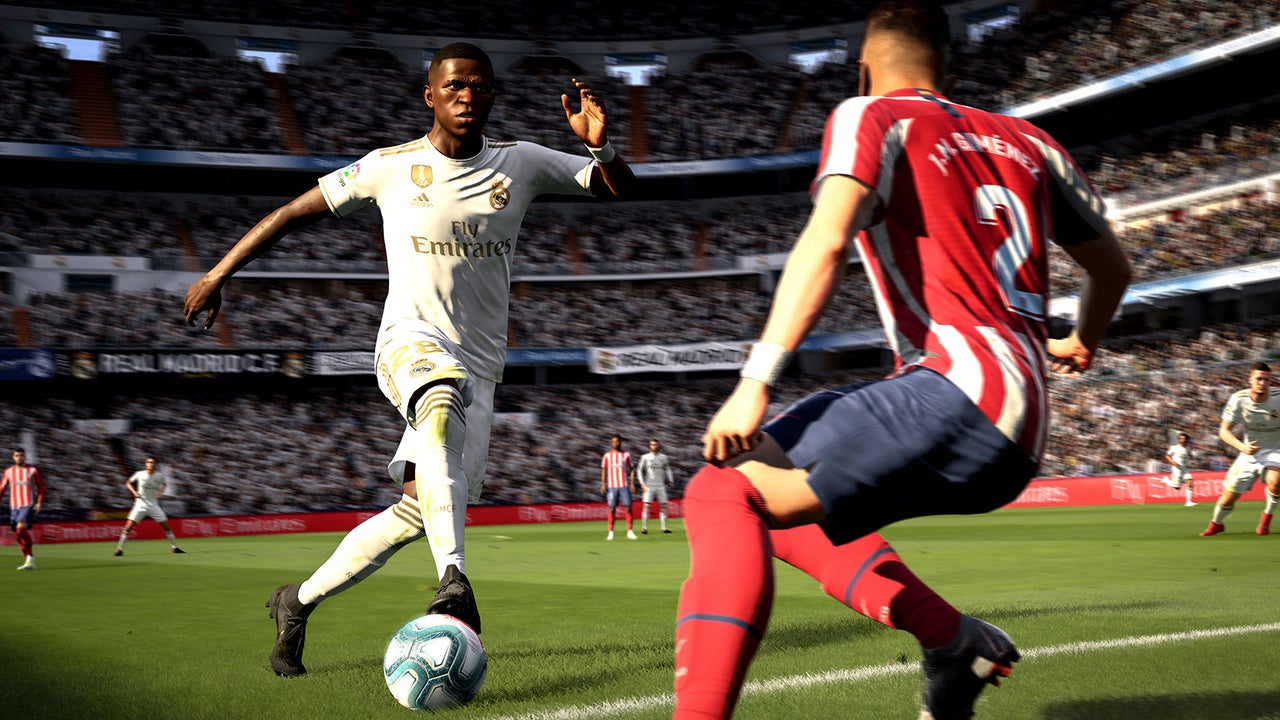 Real Madrid player dribbling Atletico Madrid defender in FIFA 20