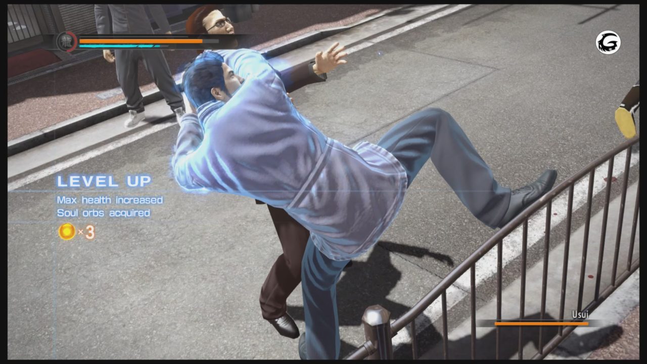 Kiryu is about to brutally beat this man's face in